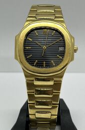 Patek Philippe Nautilus full gold Boite & extrait des archives 1984